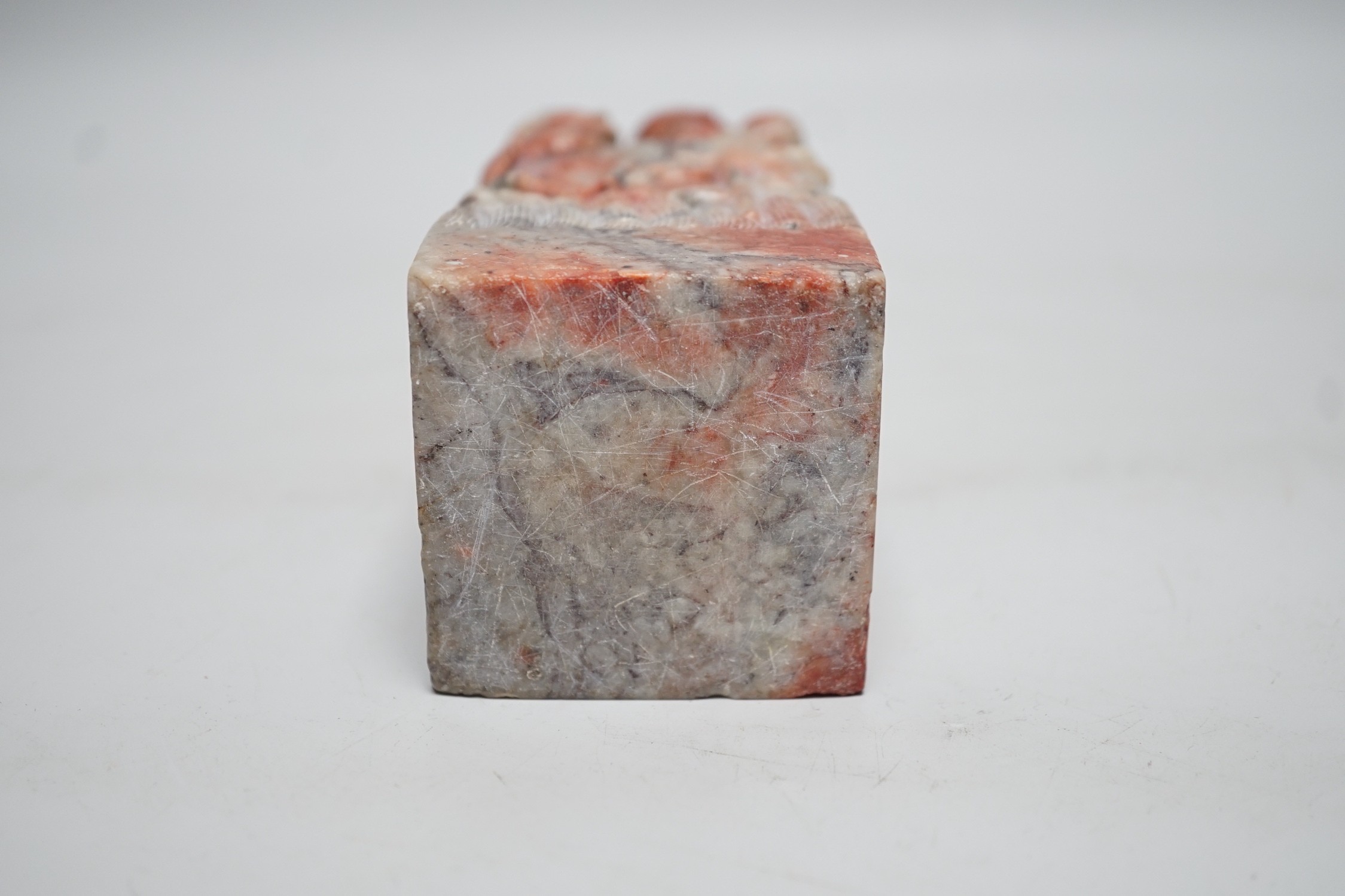 A large Chinese ‘chicken blood’ soapstone seal, Qing dynasty. 15cm